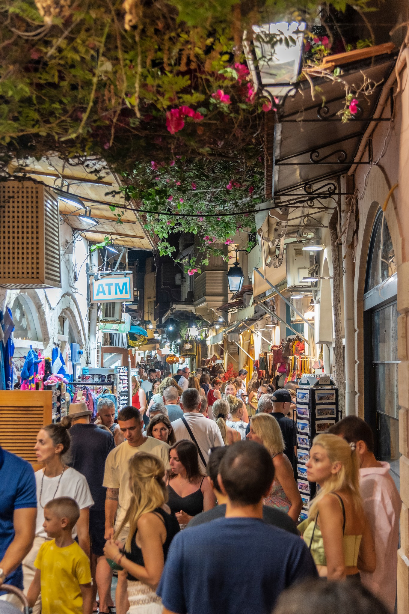 People walking through the picturesque narrow alleys of Rethymno Old Town, Crete